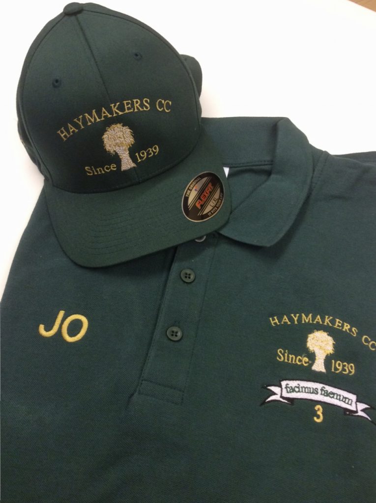 Dark green T shirt with matching cap