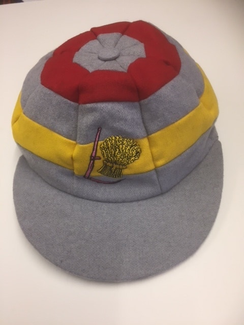 Grey, Red and Yellow cap