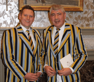 Gentlemen in Grey, Black and Yellow Blazers